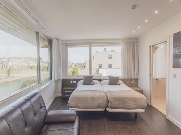 Pensión Riberas del Urumea : photo 8 de la chambre chambre double ou lits jumeaux - vue sur rivière