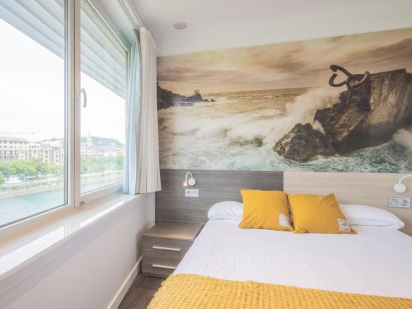 Pensión Riberas del Urumea : photo 6 de la chambre chambre double ou lits jumeaux - vue sur rivière