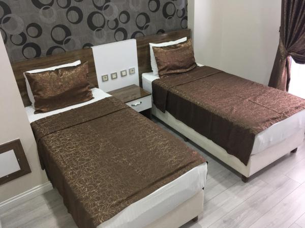 Petrol-İş İstanbul Misafirhanesi : photo 1 de la chambre chambre lits jumeaux