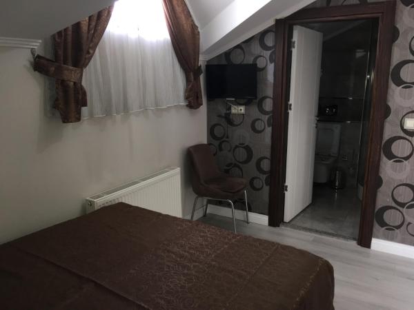 Petrol-İş İstanbul Misafirhanesi : photo 1 de la chambre chambre double - vue sur jardin