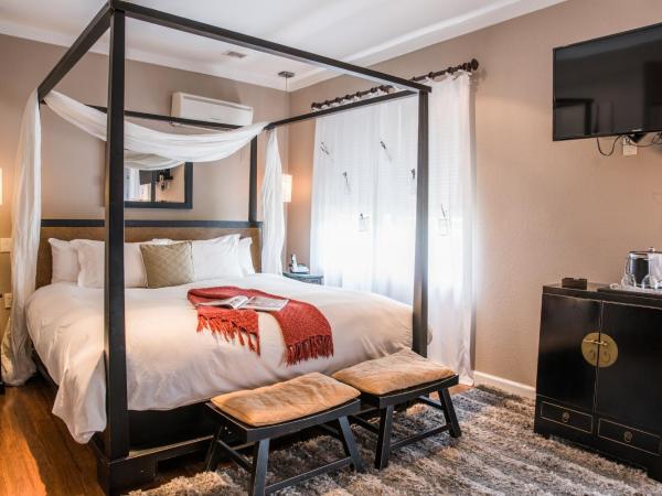 Cadet Hotel : photo 1 de la chambre suite junior avec lit king-size 