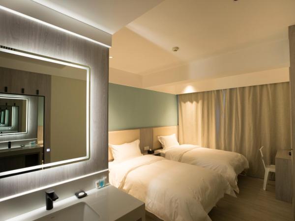 Beijing Saga Hotel : photo 1 de la chambre chambre lits jumeaux standard (sans fenêtre)