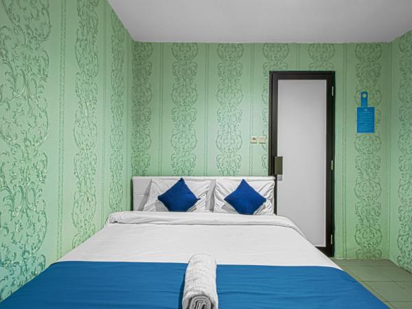 Bungur Inn Syariah : photo 1 de la chambre chambre double supérieure