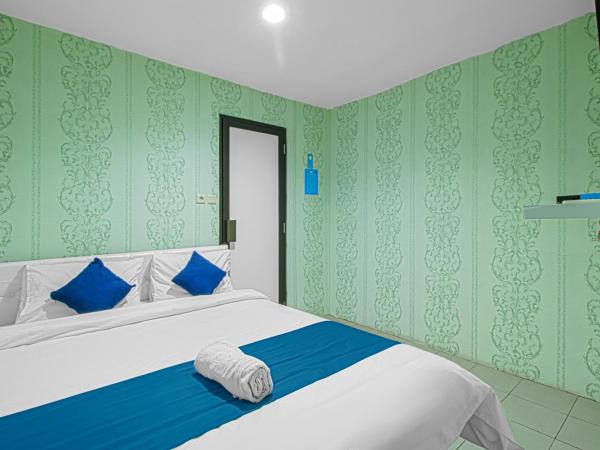 Bungur Inn Syariah : photo 6 de la chambre chambre double supérieure