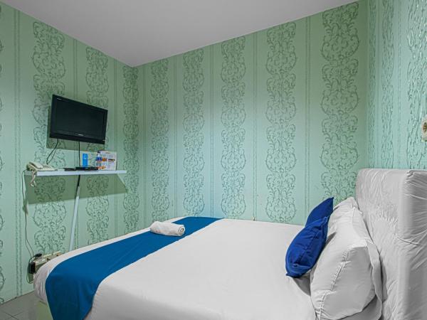 Bungur Inn Syariah : photo 4 de la chambre chambre double deluxe