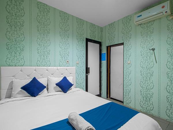 Bungur Inn Syariah : photo 2 de la chambre chambre double deluxe