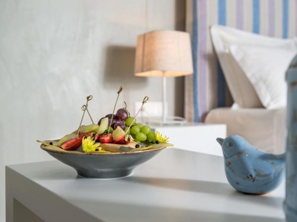 Mythical Blue Luxury Suites : photo 5 de la chambre suite junior avec jacuzzi extérieur chauffé