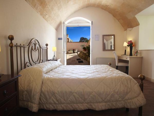 Caveoso Hotel : photo 2 de la chambre chambre double ou lits jumeaux