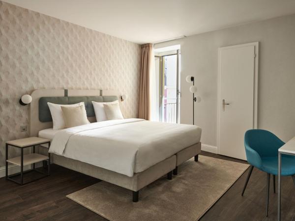 Vista Lakefront Boutique Hotel : photo 6 de la chambre chambre double lit king-size jardin