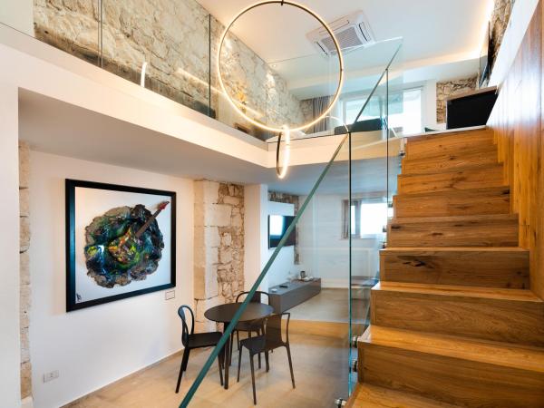 Re Dionisio Luxury Suites : photo 3 de la chambre suite deluxe