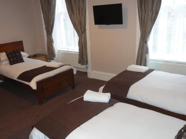 Sandyford Lodge : photo 1 de la chambre chambre triple