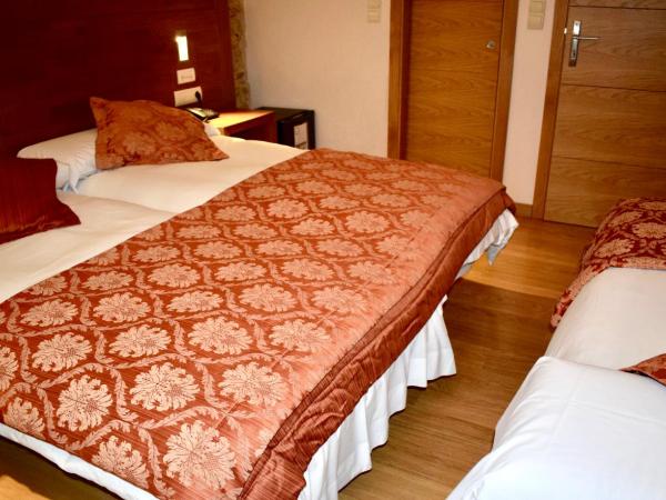 Mapoula PR Boutique : photo 3 de la chambre chambre double avec lit d'appoint