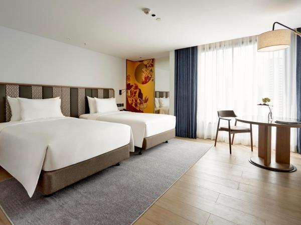 Montien Hotel Surawong Bangkok : photo 1 de la chambre chambre lits jumeaux premier