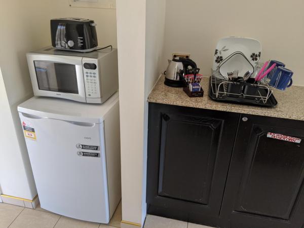 Novena Palms Motel : photo 4 de la chambre chambre lit king-size