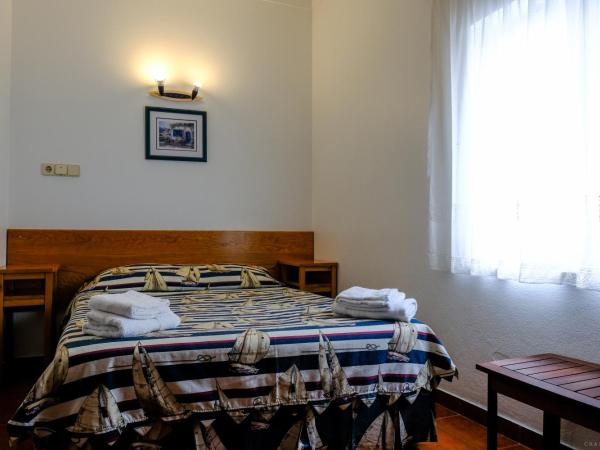 Rimavier Residence : photo 3 de la chambre chambre double avec salle de bains privative