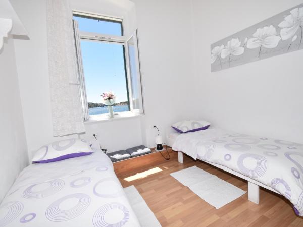 Apartmani Rina : photo 6 de la chambre chambre lits jumeaux standard - vue sur mer