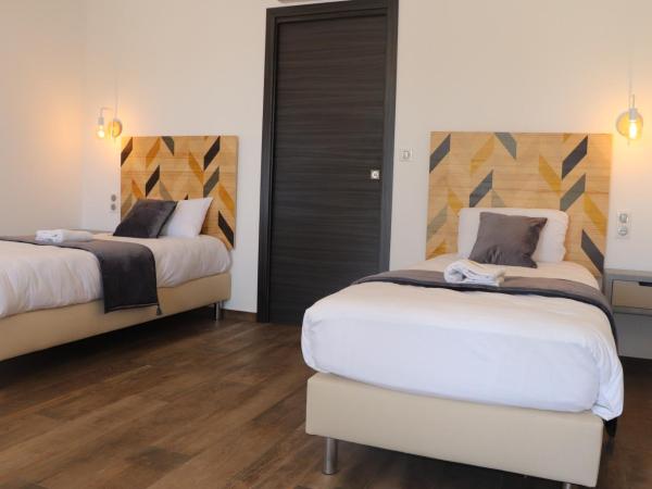 Hôtel Padolo : photo 7 de la chambre chambre familiale