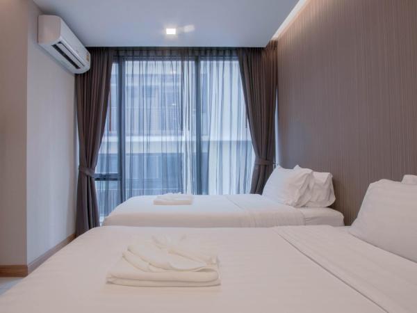 Kepler Residence Bangkok : photo 2 de la chambre grande suite lits jumeaux deluxe