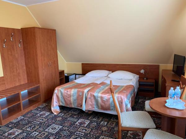 Domek - pokoje w domku na Wyspie Sobieszewskiej. : photo 2 de la chambre chambre triple