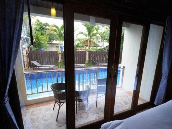 JJ Residence : photo 3 de la chambre chambre lits jumeaux deluxe avec accès à la piscine