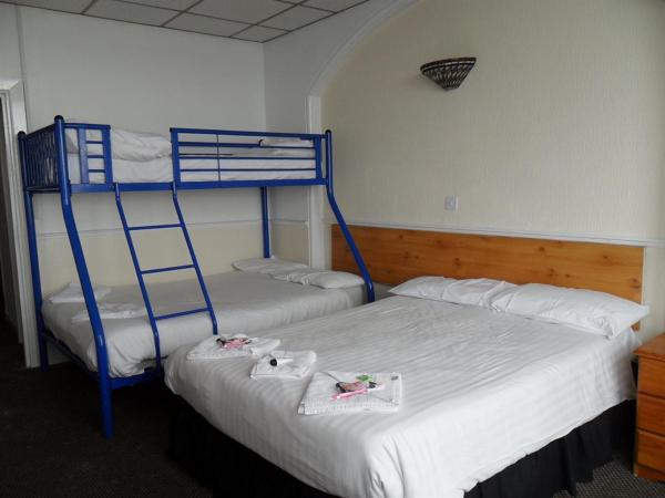 The waterfront hotel : photo 1 de la chambre chambre familiale supérieure