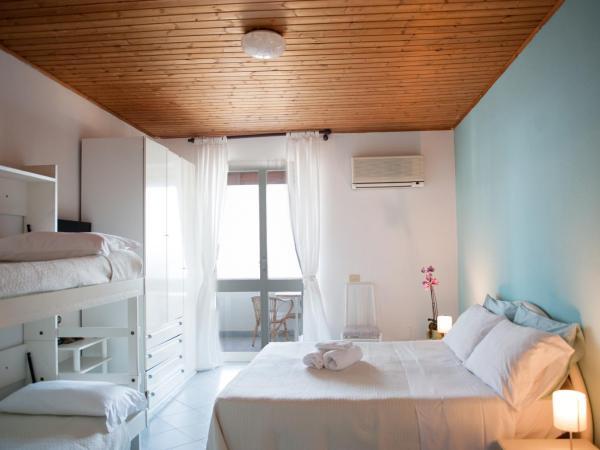 Paradise Relais Villa Janto' : photo 1 de la chambre chambre quadruple