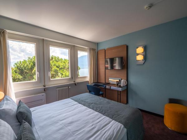 Hotel Mona Ex-Eurotel : photo 2 de la chambre mini hébergement mona - vue partielle sur lac