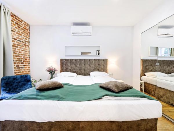 Cinema Apartments : photo 2 de la chambre appartement supérieur