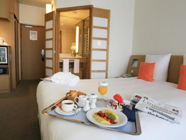 Novotel Casablanca City Center : photo 6 de la chambre chambre supérieure - 1 lit queen-size et canapé