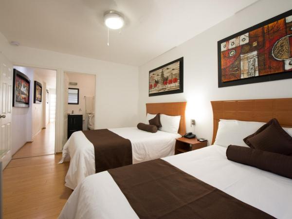 European Life Style Executive Suites : photo 2 de la chambre chambre lits jumeaux