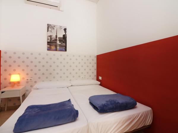 Feel Hostels City Center : photo 3 de la chambre petite chambre lits jumeaux