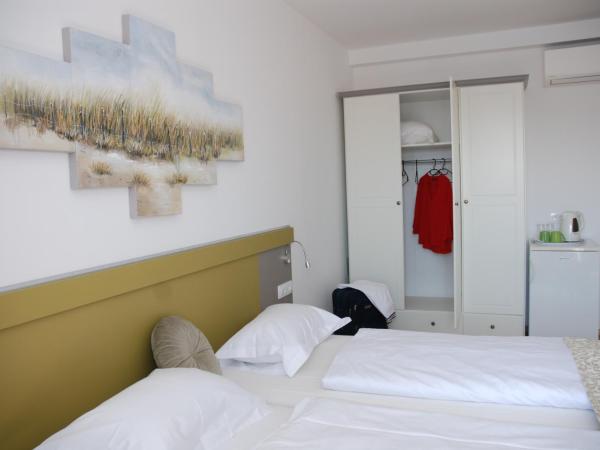 B&B Sea Joy Rovinj 1 : photo 5 de la chambre chambre lits jumeaux deluxe