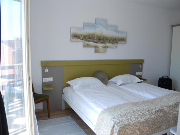 B&B Sea Joy Rovinj 1 : photo 7 de la chambre chambre lits jumeaux deluxe
