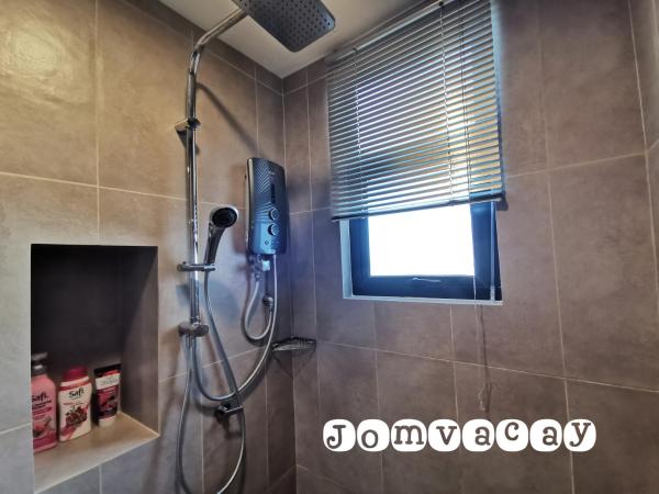 The Jomvacay Place : photo 6 de la chambre appartement - vue sur mer