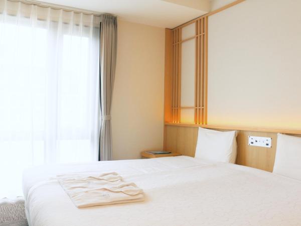 Henn na Hotel Kyoto Hachijoguchi : photo 1 de la chambre chambre lits jumeaux hollywood