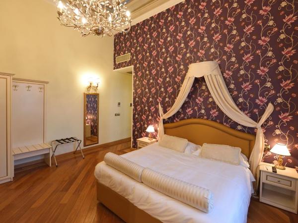 Relais La Corte di Cloris : photo 1 de la chambre suite 1 chambre avec canapé-lit