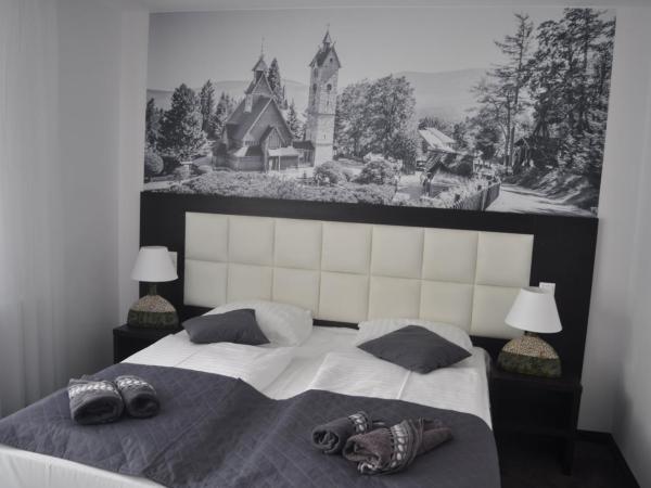 Villa Karpacz : photo 5 de la chambre chambre quadruple avec balcon