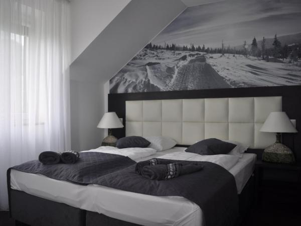 Villa Karpacz : photo 3 de la chambre chambre triple avec balcon