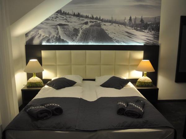 Villa Karpacz : photo 1 de la chambre chambre triple avec balcon