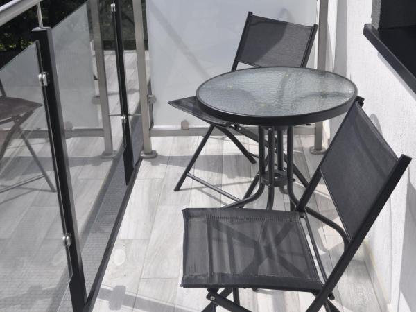 Villa Karpacz : photo 10 de la chambre chambre quadruple avec balcon