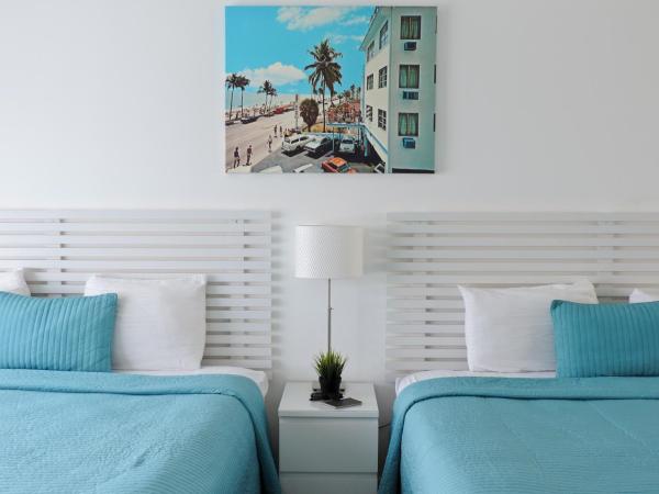 Snooze : photo 2 de la chambre chambre king de luxe avec 2 lits king-size