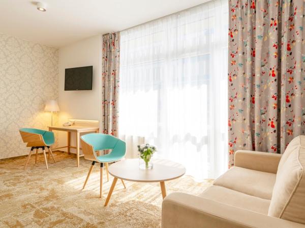 Hotel Metropol : photo 2 de la chambre chambre familiale (2 adultes et 2 enfants)