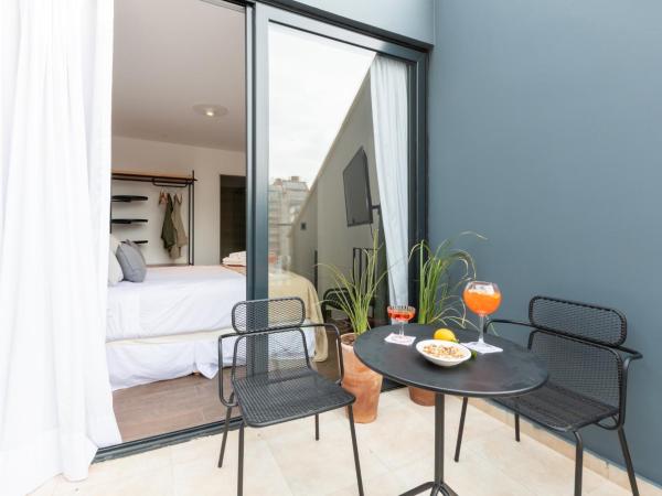 Stay Suites : photo 3 de la chambre chambre double deluxe avec balcon