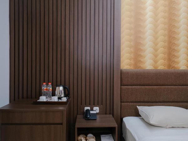 The Grand Palace Hotel Yogyakarta : photo 4 de la chambre chambre lits jumeaux deluxe