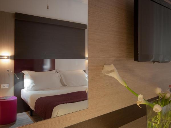 Genius Hotel Downtown : photo 3 de la chambre chambre double ou lits jumeaux