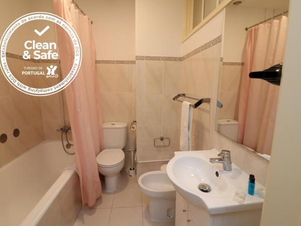 Discovery Apartment Expo : photo 10 de la chambre chambre familiale avec salle de bains privative