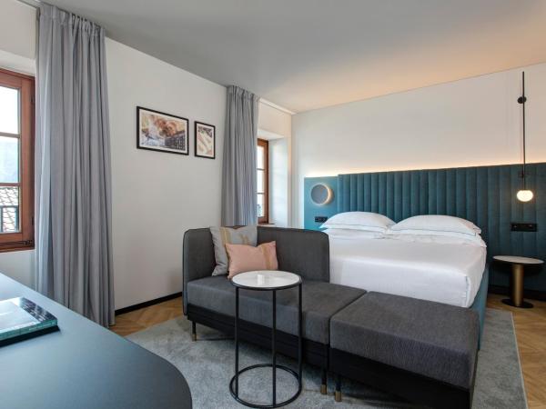 LUGANODANTE - We like you : photo 3 de la chambre chambre double ou lits jumeaux plus avec climatisation