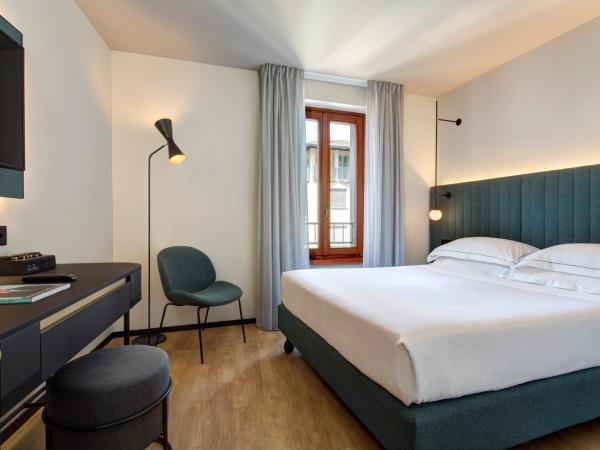 LUGANODANTE - We like you : photo 1 de la chambre chambre double ou lits jumeaux plus avec climatisation