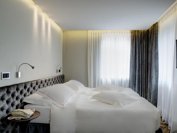 LUGANODANTE - We like you : photo 9 de la chambre chambre double ou lits jumeaux premium avec climatisation