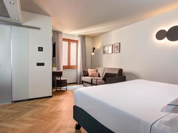 LUGANODANTE - We like you : photo 8 de la chambre chambre double ou lits jumeaux premium avec climatisation